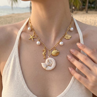 Collier en gros avec breloques océaniques en acier inoxydable, chaîne trombone, coquillages en résine, étoiles de mer et perles pendantes
