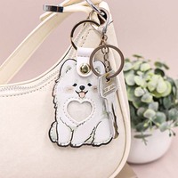 Porte-clés mignon en cuir PU en forme de chien avec compartiment de rangement pour poils, breloque portable et durable pour sac, souvenir pour les amoureux des chiens