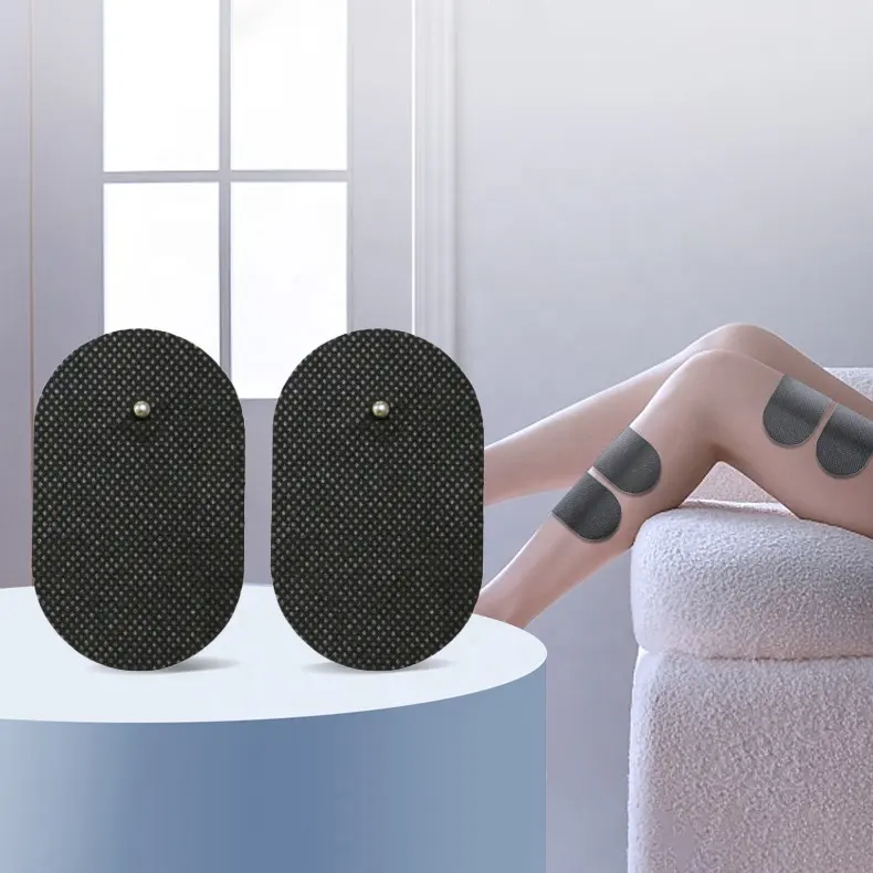 Vente en gros de tissu non tissé ovale de type bouton thérapie adulte électrode de coussin de dizaines de massage conducteur à moyenne et basse fréquence