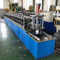 Machine de formage de rouleaux pour portes à volets roulants automatiques, système de rouleaux motorisé pour construction en acier