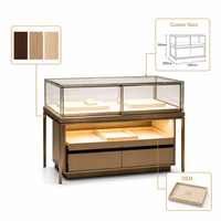 Vitrine d'îlot de luxe en métal pour bijoux, avec éclairage LED et tiroirs de rangement, idéale pour la présentation de montres et de diamants en boutique