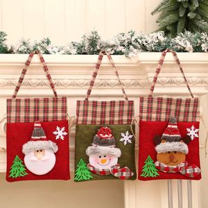 Sacs cadeaux de Noël, pochettes à cordon, emballages pour bonbons, pochettes pour cadeaux de fête, sacs de rangement pour cadeaux avec motifs Père Noël, bonhomme de neige, renne - Product Image 3