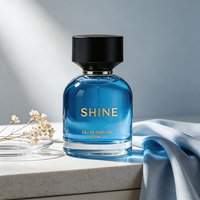 Flacon de parfum élégant et transparent de qualité supérieure, 30 ml, 50 ml, 100 ml, flacon en verre vide avec pulvérisateur à pompe et impression sérigraphique, bouchon noir