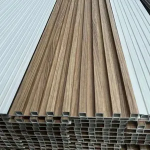 室内UV石材墙面覆板木质pvc面板木质塑料复合板