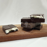 Fábrica de dulces al por mayor Dubai Chocolate algodón caramelo rico y suave leche relleno de pistacho aperitivos dulces orientales con mermelada