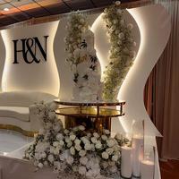 Panneau de fond de scène LED de luxe personnalisé en acrylique ondulé avec lumière chaude pour événements et réceptions