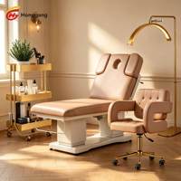 Table de massage électrique en cuir PU blanc à 4 moteurs inclinables pour clinique de beauté