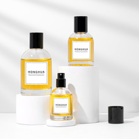 Flacons de parfum en verre de qualité supérieure en gros, 50 ml et 100 ml, avec un élégant capuchon pulvérisateur et un coffret cadeau pour une utilisation en marque privée