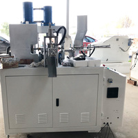 Machine automatique à double station pour la fabrication de connecteurs de câbles et de bornes de fils en cuivre