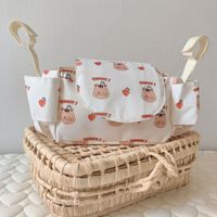 Sac de rangement multifonctionnel imperméable grande capacité pour couches de bébé avec porte-gobelet amovible et accessoires de suspension pour poussette