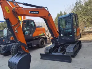 รถขุดขนาดเล็ก Develon DX60E พร้อมเครื่องยนต์และปั๊ม - กำลังขุดสูง ดีไซน์กะทัดรัด เหมาะสำหรับงานก่อสร้างและงานฟาร์ม - Product Image 1