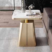 Table basse compacte de luxe léger avec plateau en pierre et structure en fer, design moderne et créatif pour salon