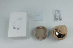 Lujo impermeable recargable eléctrico oro nuevo masajeador de cabeza inalámbrico un botón fácil uso masajeador de cuero cabelludo - Product Image 4