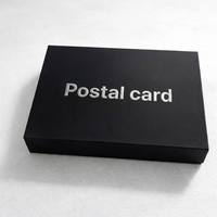 Boîte cadeau rigide noire personnalisée avec gaufrage argenté, pelliculage brillant, emballage en papier recyclable PPWR, écologique, carrée