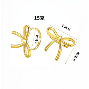 <span class=keywords><strong>Portatovaglioli</strong></span> in Lega Dorata a Forma di Fiocco per Cene, Matrimoni, Banchetti, Riunioni Familiari, Decorazione Tavola - Product Image 3