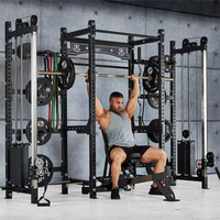 Venta al por mayor de equipos personalizados Pro Fitness Gym multifunción Squat Power Rack Smith Machine con pilas de peso