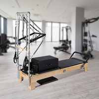 Máquinas de reformador de estudio de Pilates de alta calidad, entrenamiento de Yoga en casa, medio trapecio de madera de roble, reformador de Pilates con torre