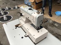 Machine à coudre industrielle surjeteuse à quatre fils de haute qualité, d'occasion, 80% neuve, haute vitesse, 220V, 550W