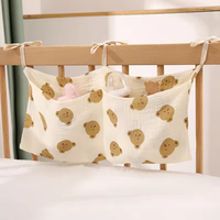 Sac organisateur multifonctionnel suspendu à double couche et double poche en coton pour les essentiels et les jouets de poussette de bébé, fabriqué en Chine