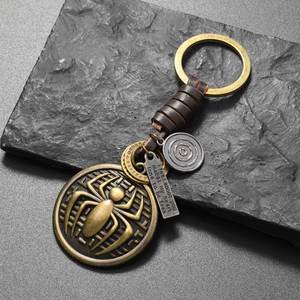 Porte-clés de voiture en métal rétro en alliage avec pendentif emblème araignée en cuir tressé, style simple et distinctif - Product Image 2