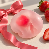 Jouet anti-stress en TPR translucide rose en forme de fraise Mochi pour enfants