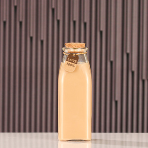 Botellas de Vidrio Transparentes Redondas Vacías al por Mayor de 150ml-500ml para Leche/Zumo/Té/Bebidas con Tapa de Plástico Apilables y Portátiles - Product Image 4