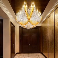 Lustre moderne en cristal et acier inoxydable doré de luxe avec télécommande, idéal pour les halls d'hôtel et les villas, avec LED en verre