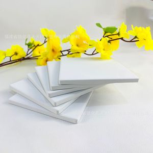 Posavasos Cuadrados Tian Tian Hong de Cerámica, 10.3 cm, Blancos, de Tierra de Diatomeas, Base de Corcho Antideslizante para Protección de Bebidas - Product Image 1