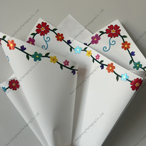 Xiangheng Chất liệu hoa giấy gói thời trang đơn giản bao bì sáng tạo cỏ ba lá hoa in hoa giấy gói - Product Image 1