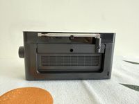 Radio portable AM/FM de type pointeur, récepteur compact noir élégant avec antenne télescopique et poignée de transport