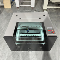 JingKe 2024 la dernière machine de gravure laser co2 50W 60W 80W 100W 6040 pour bois acrylique avec système Ruida M3