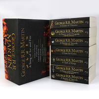 Littérature pour l'adolescence : Ensemble de 7 romans de la série Game of Thrones de George R.R. Martin, édition complète, reliure souple en fil de papier léger