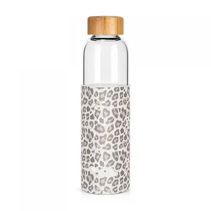 Vente en gros de bouteilles d'eau en verre promotionnelles avec logo personnalisé oem odm haute température 500ml 17oz sublimation 1 litre