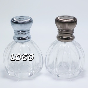 ขวดน้ำหอมแก้วทรงกลมใส ขนาด 50 มล. รุ่น MUB ดีไซน์ใหม่ พร้อมฝาซิงค์หรูหรา - Product Image 1