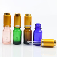 Bouteilles compte-gouttes en verre de luxe avec bouton-poussoir pour huiles essentielles, sérums et parfums – Vente en gros – 30 ml, 50 ml, 100 ml