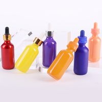 Flacon compte-gouttes à vis en verre d'huile essentielle de couleur personnalisée 30ml 60ml 120ml Flacon compte-gouttes en verre noir mat pour sérum cosmétique