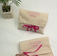 Pochette en toile beige avec impression personnalisée du logo, fermeture à ruban, sac d'emballage cosmétique