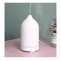 Humidificateur d'air en porcelaine pour bureau à domicile Diffuseur d'huiles essentielles en céramique Diffuseur d'arômes ultrasonique électrique Humidificateur d'air