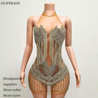 Robe de soirée courte en maille transparente avec cristaux argentés brillants, style luxueux pour femmes, idéale pour les soirées en club, les cocktails et les fêtes d'été.