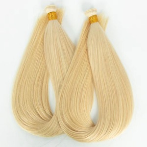 Extensiones de Cabello Humano Remy 613 Rubio, Tejidas a Mano, Lisas y Sedosas, Ligeras - Product Image 1