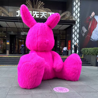 Décoration géante gonflable en forme de lapin en peluche avec ventilateur intégré, en tissu Oxford, durable et facile à installer pour les événements promotionnels intérieurs/extérieurs