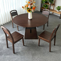 La table ronde extensible de style vintage et minimaliste, idéale pour les rassemblements de groupe, convient aux maisons, hôtels et restaurants.