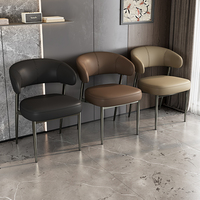 Chaise de salle à manger en cuir de luxe léger, coussin à ressort épaissi, hôtel moderne simple, dossier haut de gamme, style italien, chaise de restaurant