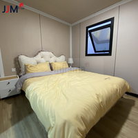 Maison conteneur sécurisée préfabriquée pliable et extensible, résistante aux ouragans, de 20 pieds ou 40 pieds, avec 2 chambres, salle de bain et cuisine