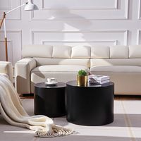 Ensemble de table basse et d'appoint cylindrique noir contemporain à profil bas