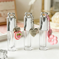 2,5 ml Tapa plateada en forma de corazón Tubo de brillo de labios Embalaje Mini tubo de brillo de labios con encanto Tubo de aceite de labios con orificio para colgar