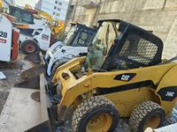 Gebrauchter Original Caterpillar CAT246 Radlader CAT246c Mini mit Motorpumpe & Antrieb - 3 Tonnen Nennlast 55 kW Leistung
