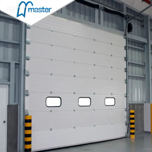 Porta sezionale verticale industriale sopraelevata del magazzino della porta del bacino dell'azionamento del motore di sicurezza finita con l'alta qualità