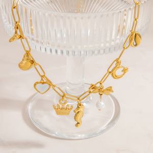 Colgante de dijes de acero inoxidable chapado en oro con diseño de margaritas, corazones, mariposas, estrellas de mar y hojas, cruz de rosa para la fabricación de joyas - Product Image 4