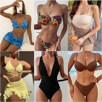 Nouveau lot de lingerie, maillots de bain et vêtements d'occasion en stock, vendus par lot, assortiment varié de robes, hauts et autres articles de seconde main